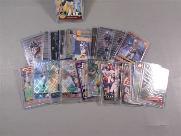 COLLECTION OF FOOTBALL TRADING CARDS IN HARD COVERS