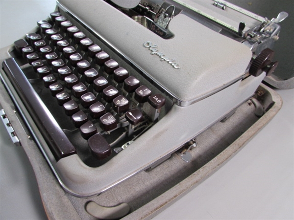 VINTAGE OLYMPIA PORTABLE TYPEWRITER IN CARRY CASE