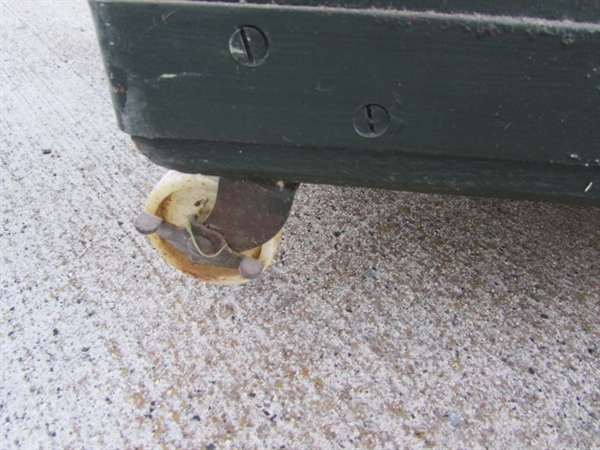 LARGE HEAVY DUTY WOODEN TRUNK ON CASTORS (MISSING 1 WHEEL)