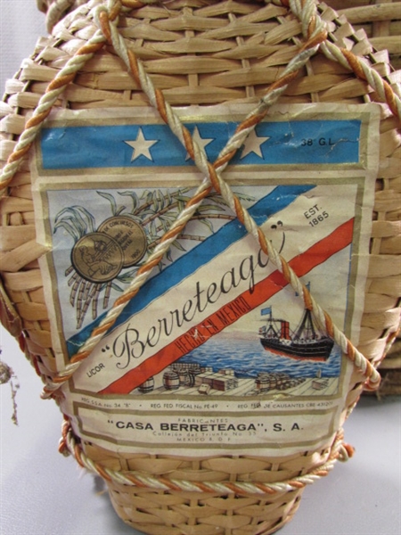 VERY LARGE WICKER WINE BOTTLE & SMALLER BOTTLE