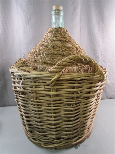 VERY LARGE WICKER WINE BOTTLE & SMALLER BOTTLE