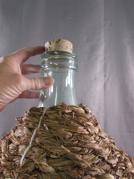 VERY LARGE WICKER WINE BOTTLE & SMALLER BOTTLE