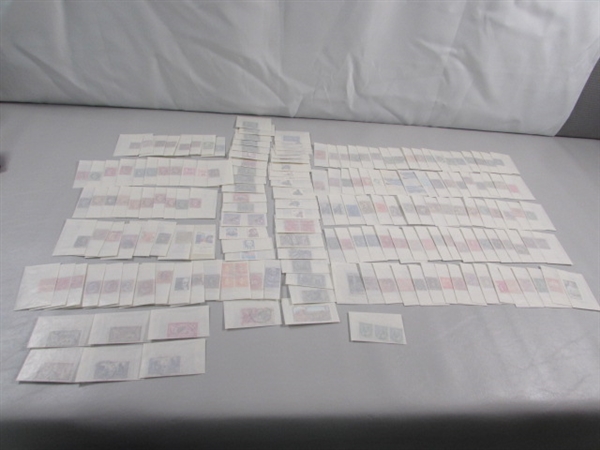 MIXED LOT OF POSTAGE STAMP SINGLES IN GLASSINE ENVELOPES #4