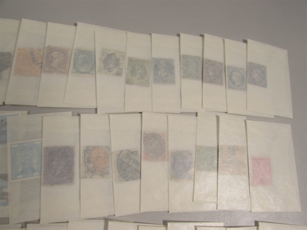 MIXED LOT OF POSTAGE STAMP SINGLES IN GLASSINE ENVELOPES #4