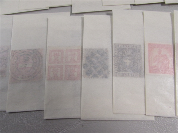 MIXED LOT OF POSTAGE STAMP SINGLES IN GLASSINE ENVELOPES #4