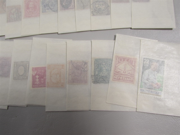 MIXED LOT OF POSTAGE STAMP SINGLES IN GLASSINE ENVELOPES #4
