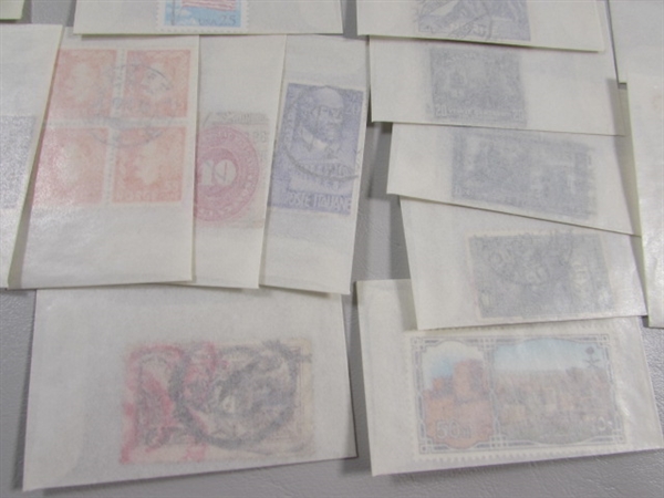 MIXED LOT OF POSTAGE STAMP SINGLES IN GLASSINE ENVELOPES #4