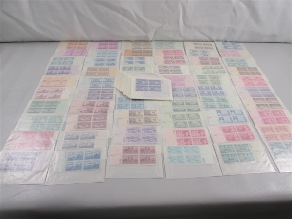 MOSTLY 3 CENT US POSTAGE STAMP BLOCKS IN GLASSINE ENVELOPES-UNUSED