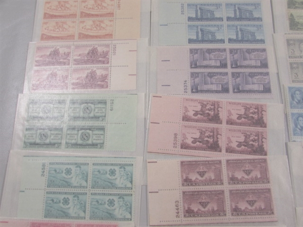 MOSTLY 3 CENT US POSTAGE STAMP BLOCKS IN GLASSINE ENVELOPES-UNUSED