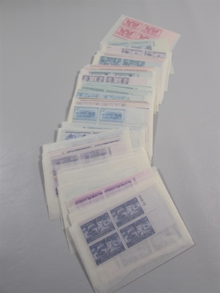 MOSTLY 3 CENT US POSTAGE STAMP BLOCKS IN GLASSINE ENVELOPES-UNUSED