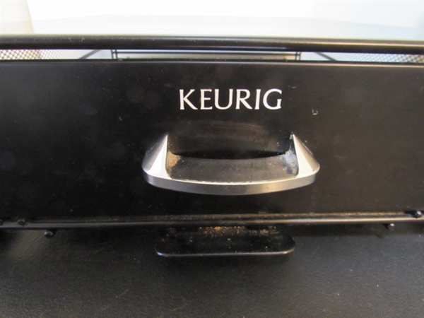 KEURIG COFFEE MAKER W/POD STORAGE DRAWER & MUG WITH WARMER
