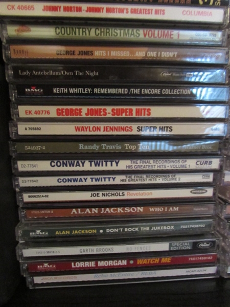 COLLECTION OF MUSIC CD'S & MINI CD PLAYER W/SPEAKERS