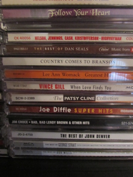 COLLECTION OF MUSIC CD'S & MINI CD PLAYER W/SPEAKERS