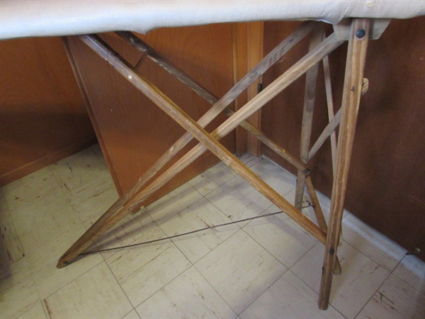 VINTAGE WOODEN FRAME IRONING BOARD, IRON, LAUNDRY BASKET & CLOTHESPINS IN APRON