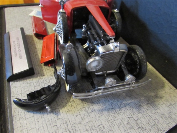 FRANKLIN MINT 1/24 SCALE 1928 STUTZ BLACK HAWK BOATTAIL SPEEDSTER DIECAST CAR IN CASE (NEEDS REPAIR)