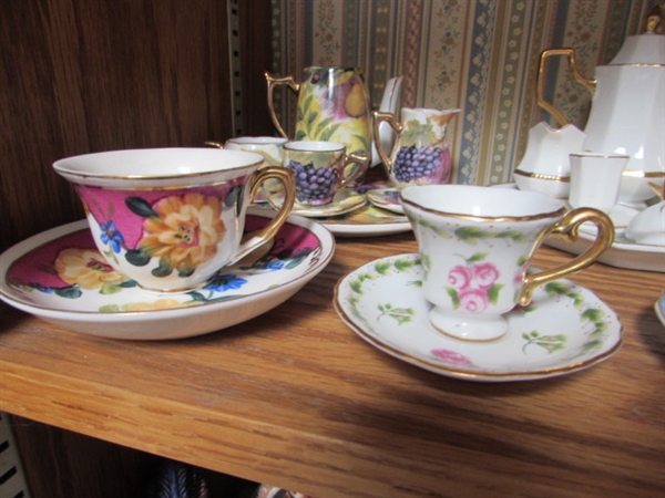 VARIETY OF MINIATURE TEA CUPS, SAUCERS AND TEAPOT W/ ONE 25 YEAR ANNIVERSARY PLATE