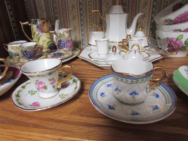 VARIETY OF MINIATURE TEA CUPS, SAUCERS AND TEAPOT W/ ONE 25 YEAR ANNIVERSARY PLATE