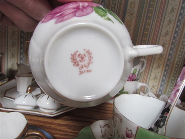 VARIETY OF MINIATURE TEA CUPS, SAUCERS AND TEAPOT W/ ONE 25 YEAR ANNIVERSARY PLATE