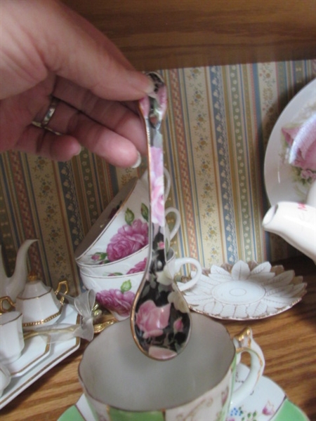 VARIETY OF MINIATURE TEA CUPS, SAUCERS AND TEAPOT W/ ONE 25 YEAR ANNIVERSARY PLATE