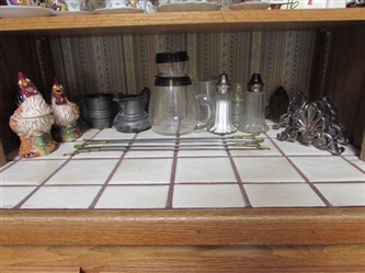VINTAGE SILVERPLATE CREAMER, SALT & PEPPER SHAKERS, CERAMIC ROOSTERS, BRASS BULL HEAD SKEWERS & VINTAGE ROLY POLY GLASS PITCHER W/ONE GLASS