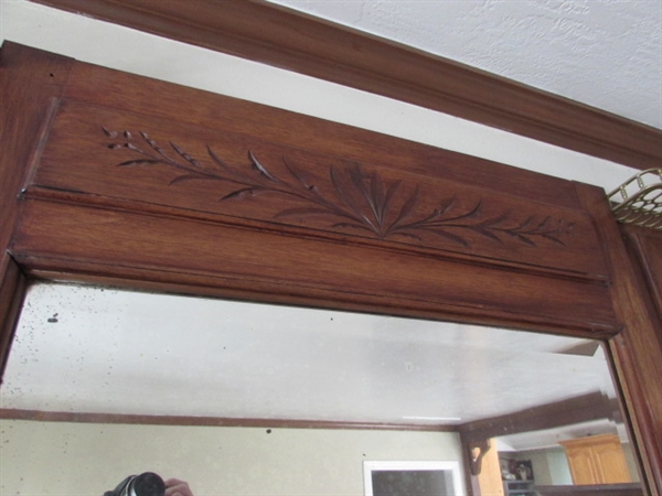 VINTAGE WOOD FIREPLACE MANTEL WITH CARVED ACCENTS AND BEVELED MIRRORS