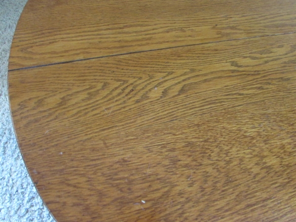 LARGE ROUND OAK COFFEE TABLE