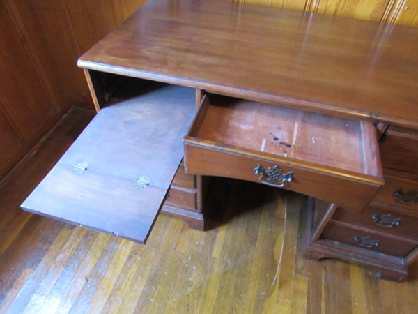 OFFICE DESK WITH SOME SUPPLIES