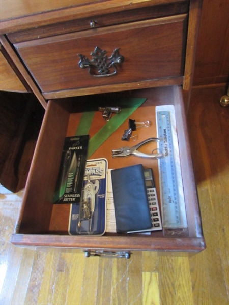OFFICE DESK WITH SOME SUPPLIES
