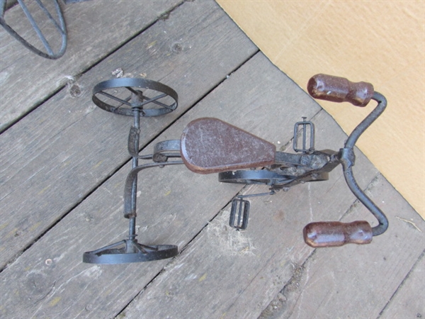 2 METAL DECORATIVE TRICYCLES, ONE WITH POT HOLDER