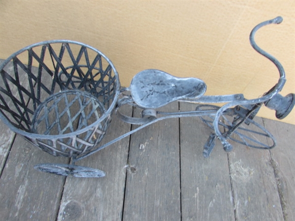 2 METAL DECORATIVE TRICYCLES, ONE WITH POT HOLDER