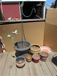 ASSORTED OUTDOOR PLANTERS, DECORATIVE STAKES AND PLANT HANGER